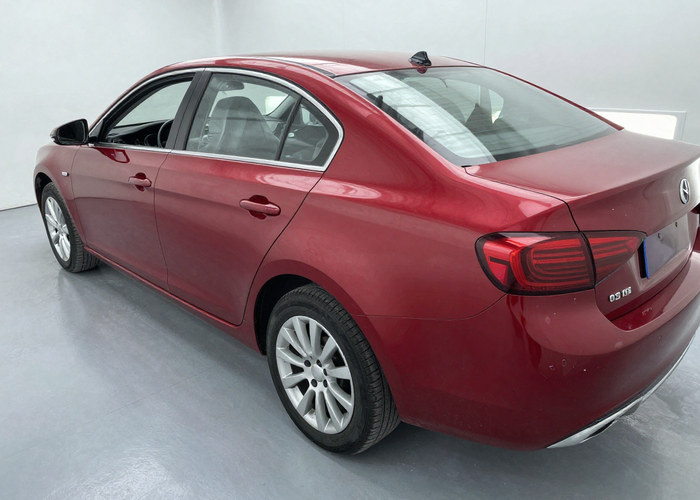 Car body repair before and after - dent removal and repainting on dark red sedan in professional auto body shop